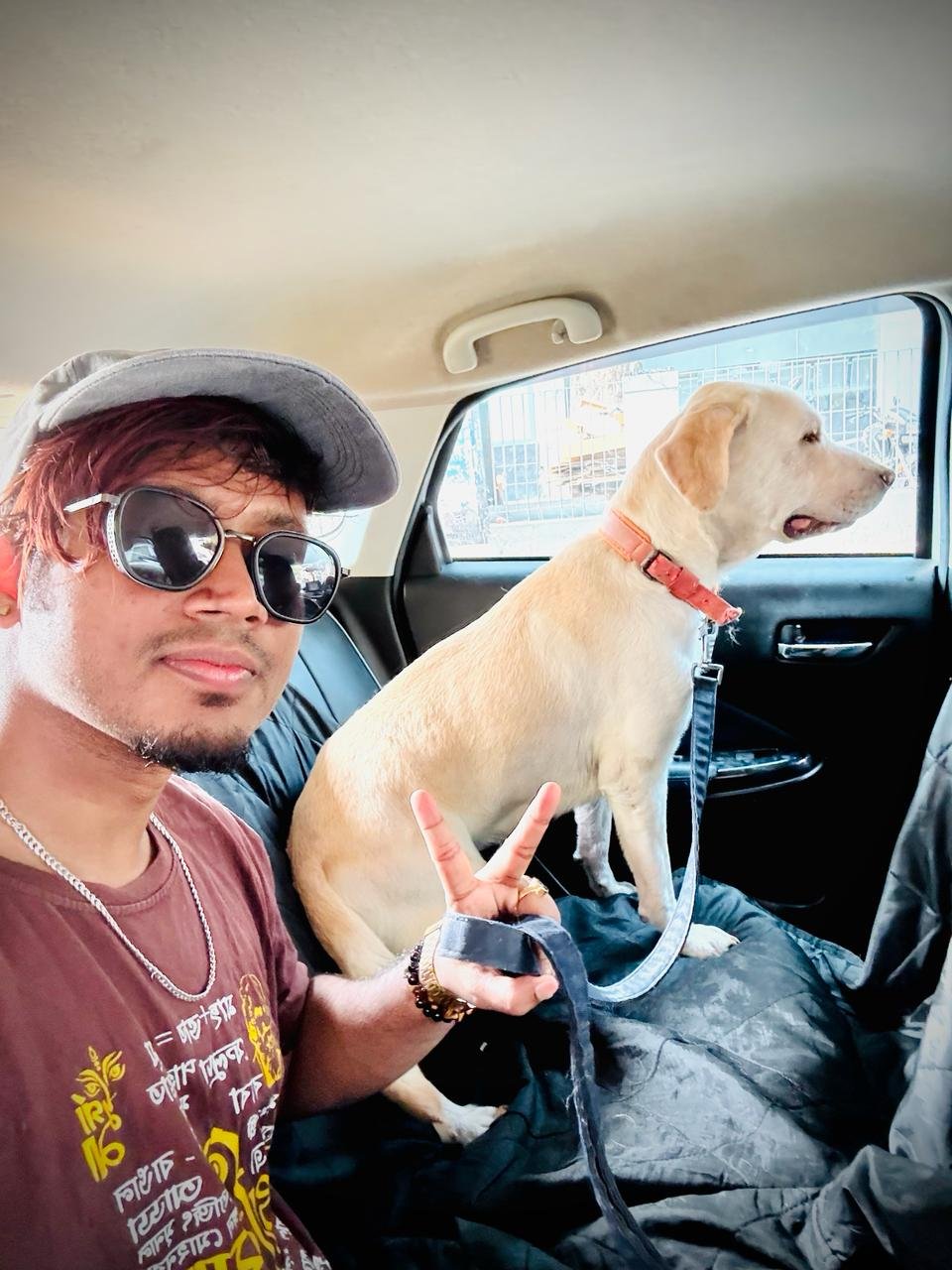 Rushi, a real Petroo customer's dog, on a Petroo ride in Kolkata